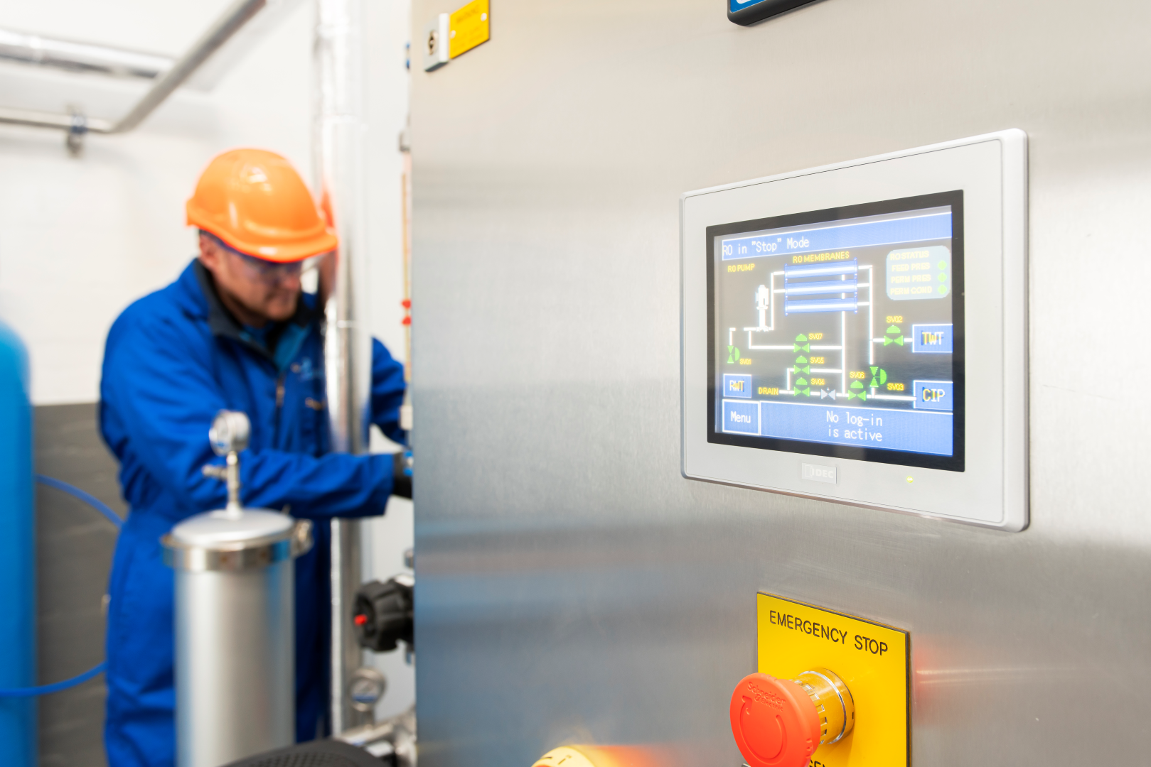 Hydra-Clear service engineer maintaining industrial water treatment equipment
