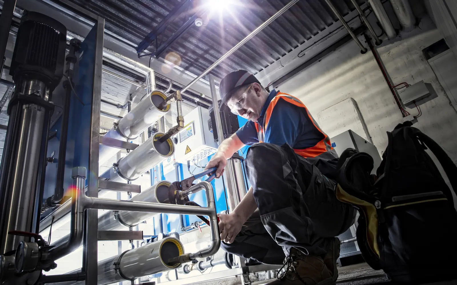 Hydra-Clear service engineer maintaining reverse osmosis equipment